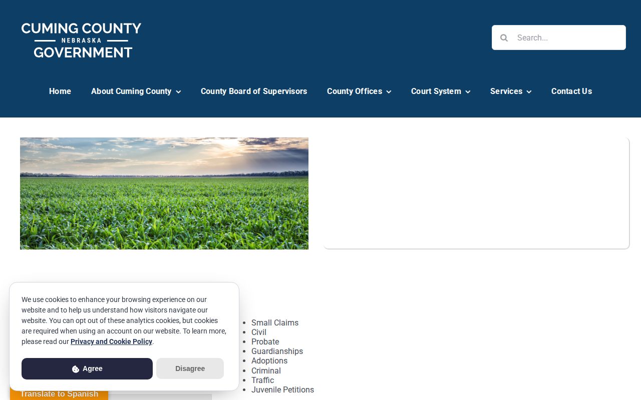 Cuming County Court webpage with court contact information for warrant verification